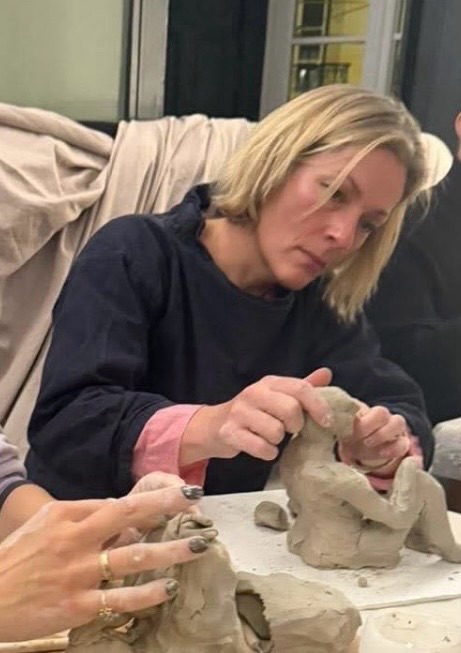 Ella - Creative Arts Facilitator working with clay